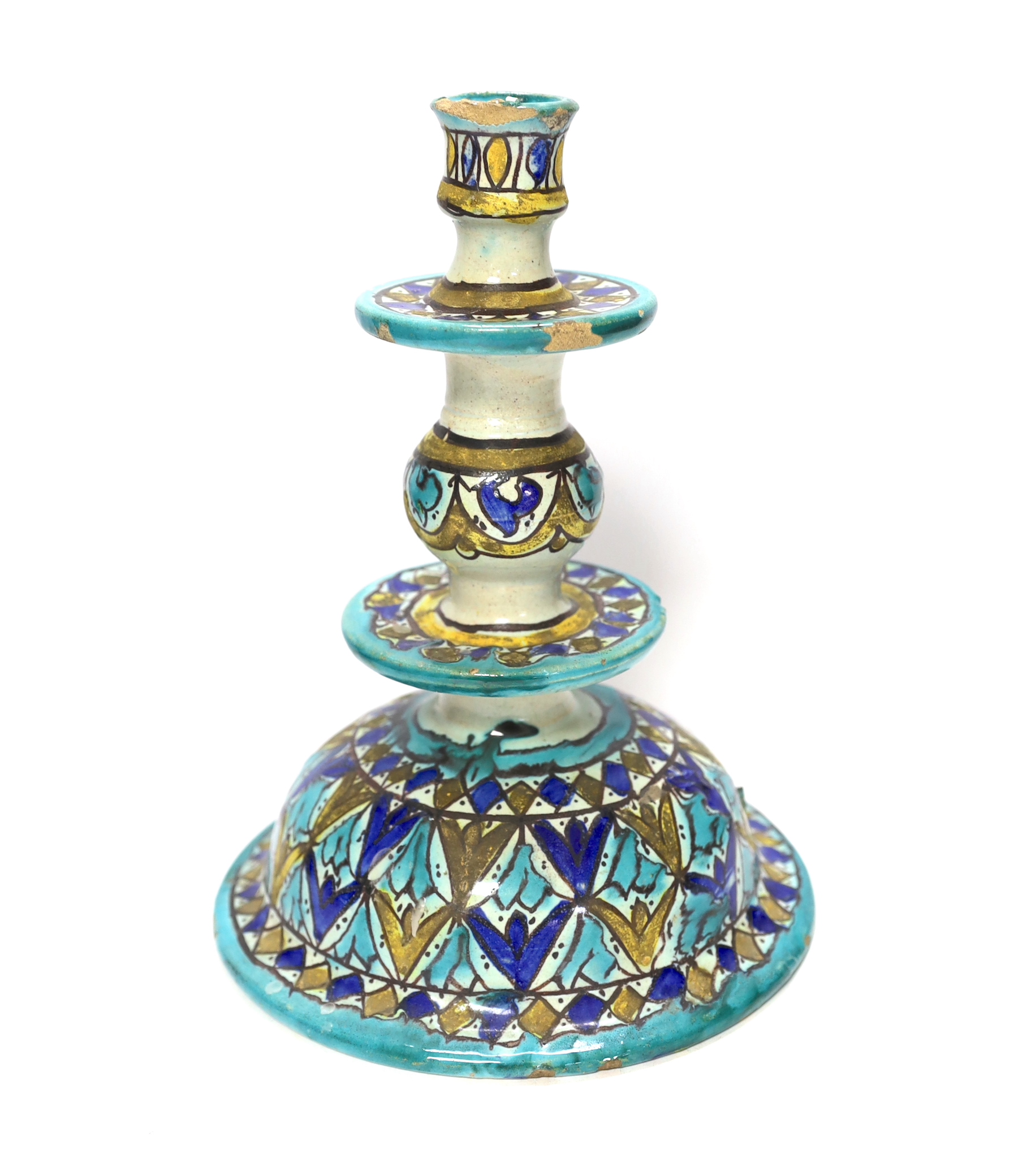 A Moroccan pottery candlestick, 24cm